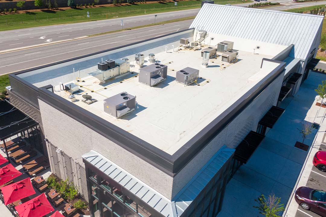 Commercial roofing installation by Foster's Roofing Enterprises